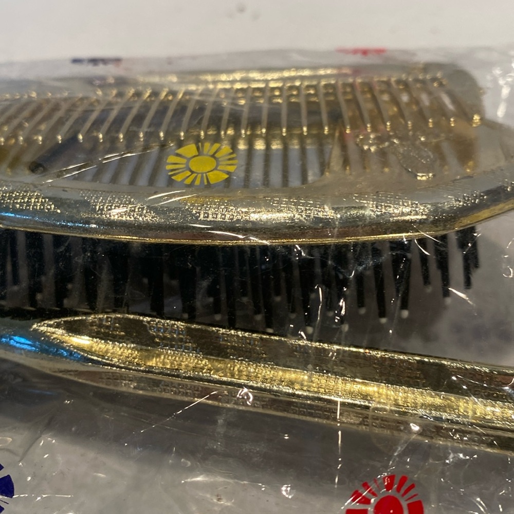 NIP Set of Mirror, 2 Brushes, and Comb